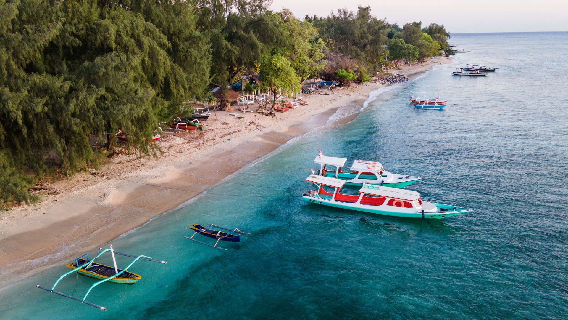 A boat arriving near Gili Air, signifying an easy start to an adventure