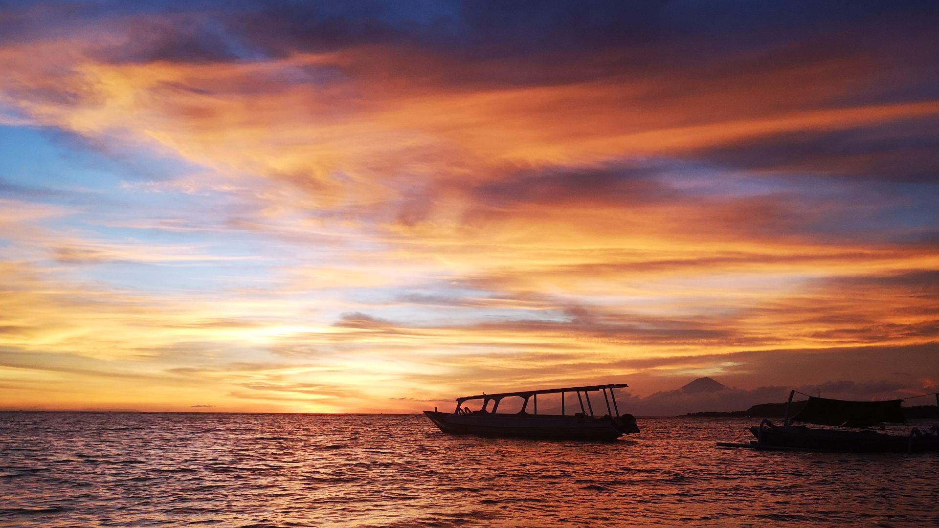 A family biking around Gili Air